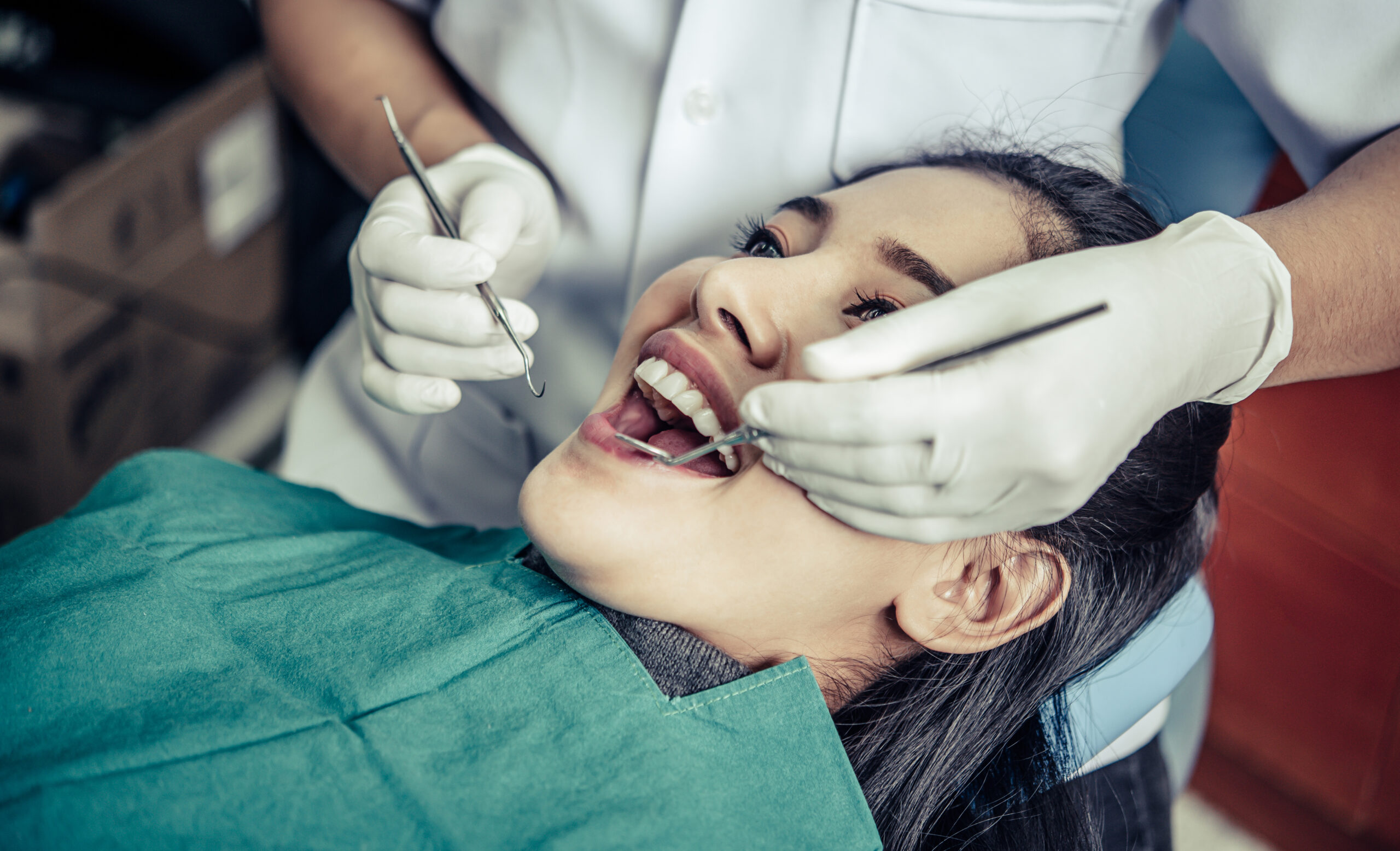 dentists treat patients' teeth.